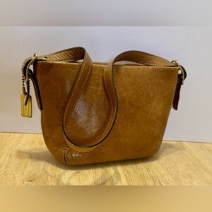 Coach light brown leather mini bucket bag